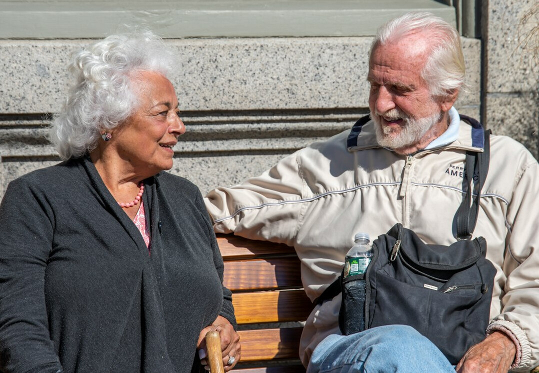 senior neighbors chatting