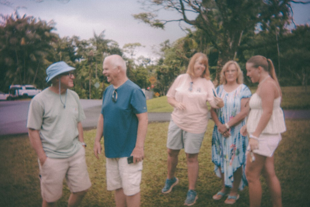 elderly friends chatting in garden